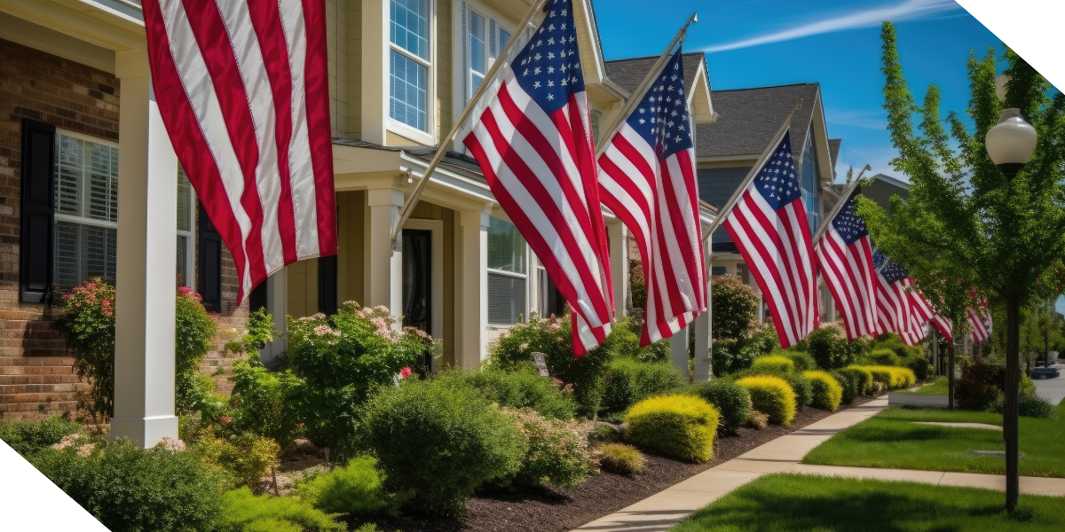 Investment-ready properties: a picturesque row of American homes, each boasting a flag-draped porch and vibrant green landscaping.