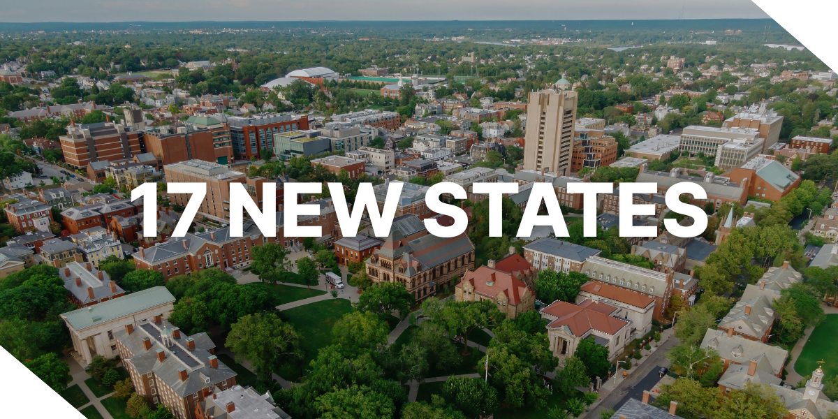 A picture showcasing real estate in Providence, Rhode Island, which is one of the 17 new states Kiavi began supporting in 2025. The text "17 NEW STATES" is overlaid on the image.