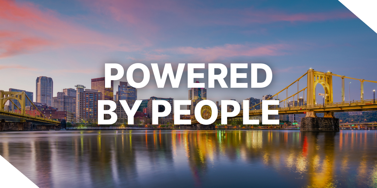 The words ‘Powered by People’ overlaid on an image of Pittsburgh where Kiavi is headquartered, representing more than 150 roles Kiavi filled in 2025.