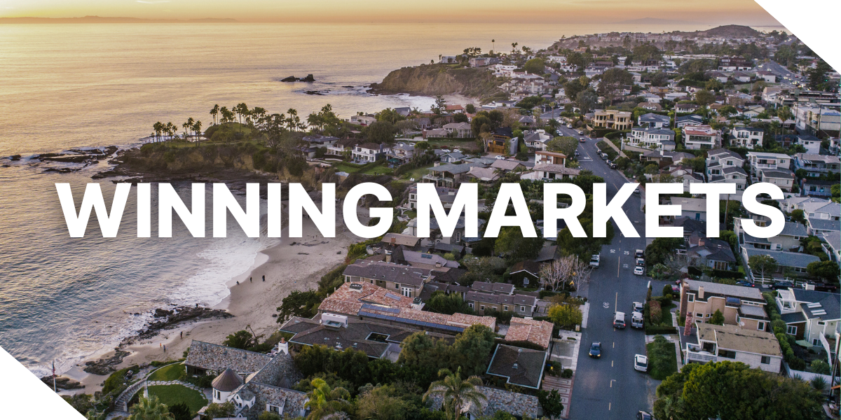 A scenic view of Orange County, California, highlighting some of the top Kiavi-financed properties from 2025, in one of the most popular regions according to our data. The words, ‘Winning Markets’ are overlaid in white.