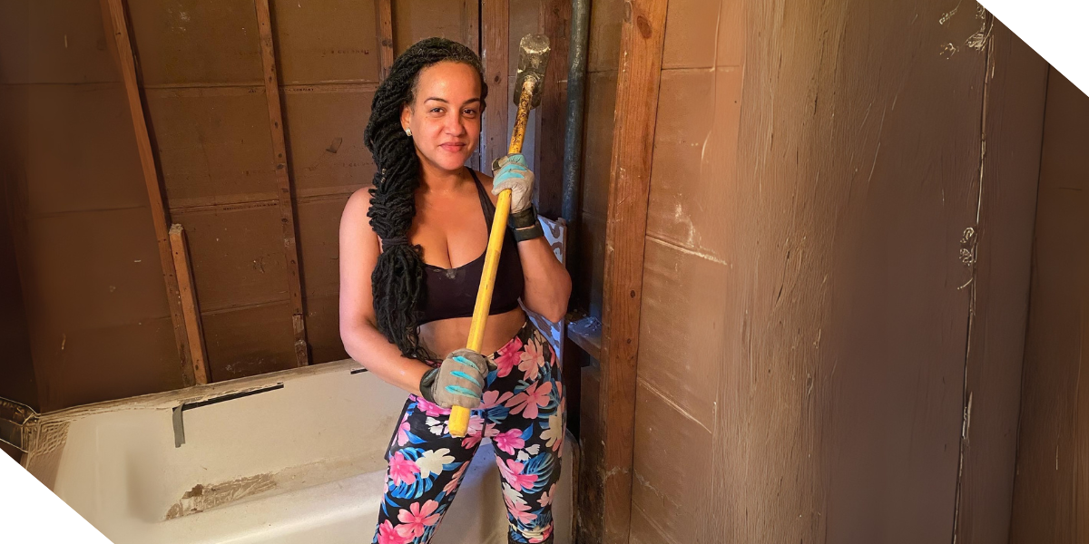 Michelle Jimenez, a real estate investor out of Pittsburgh, PA working on remodeling a bathroom in one of her rental properties.