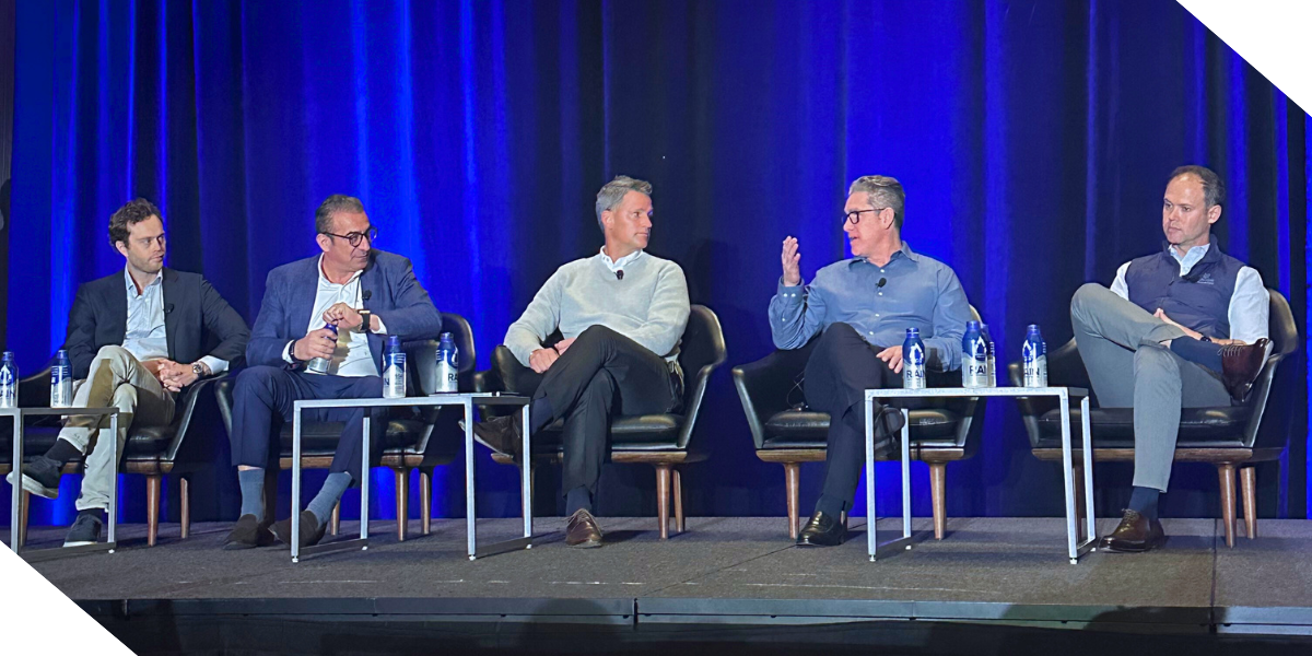 A panel of five professional speakers, including Robert Jayne, Head of Originations, Construction Lending at Kiavi at the IMN Build-to-Rent Spring event in Nashville, TN discussing industry trends on a stage.