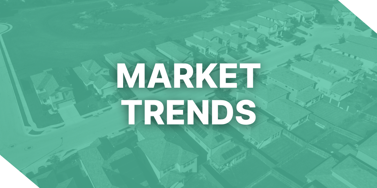 A teal-tinted aerial perspective of a residential neighborhood with "MARKET TRENDS" bolded text overlay for a Kiavi real estate financing report.