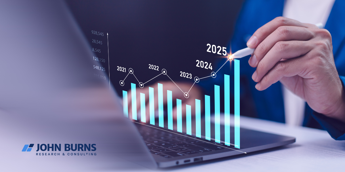 A person using a stylus to highlight a projected growth chart on a laptop, displaying years 2021-2025, referencing the John Burns Research & Consulting Q1'25 Fix-and-Flip Survey.