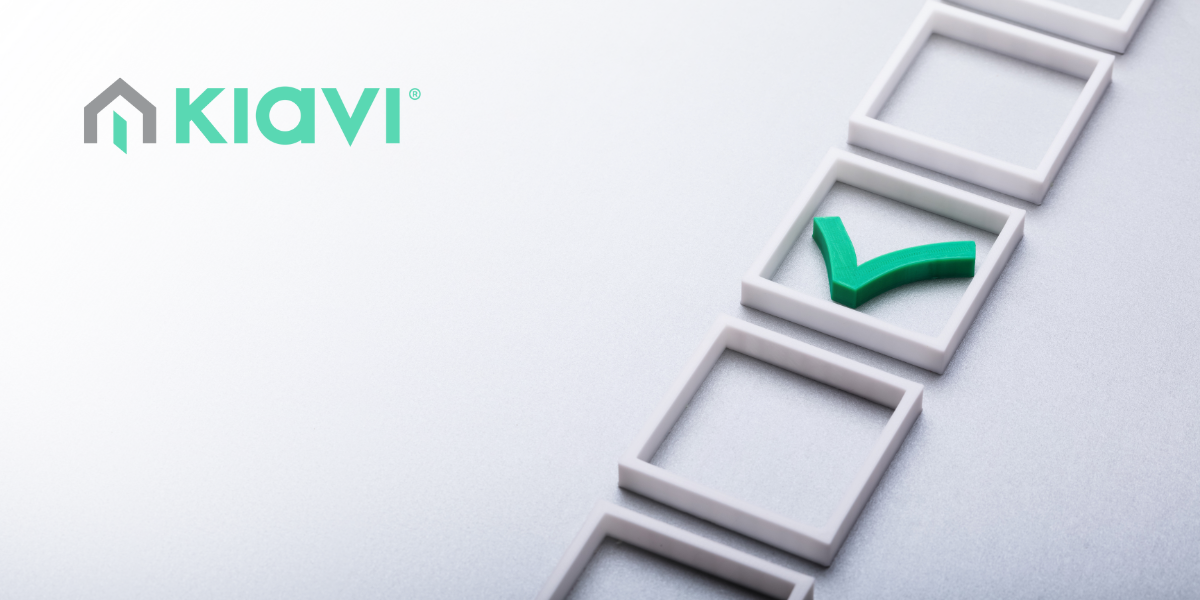 A green check mark inside a white square, representing a checklist, with Kiavi logo at the top left. 