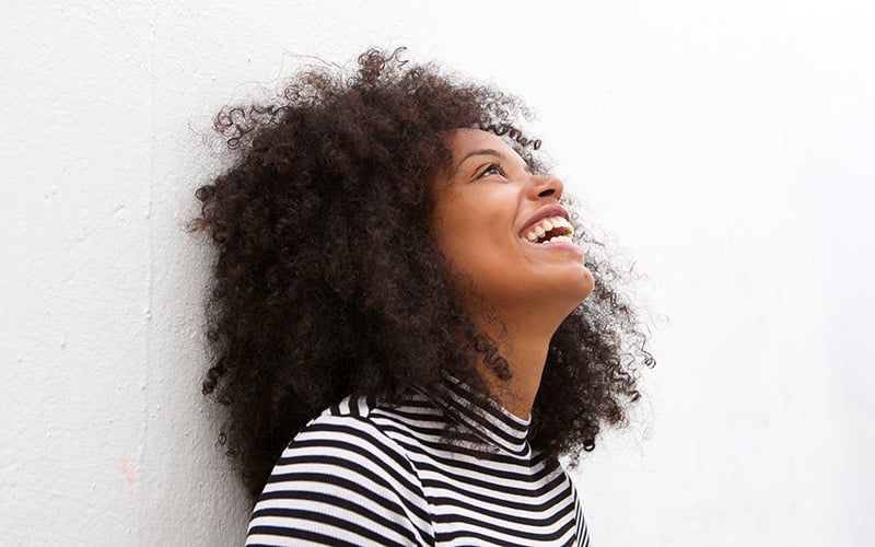 A real estate investor smiling happily